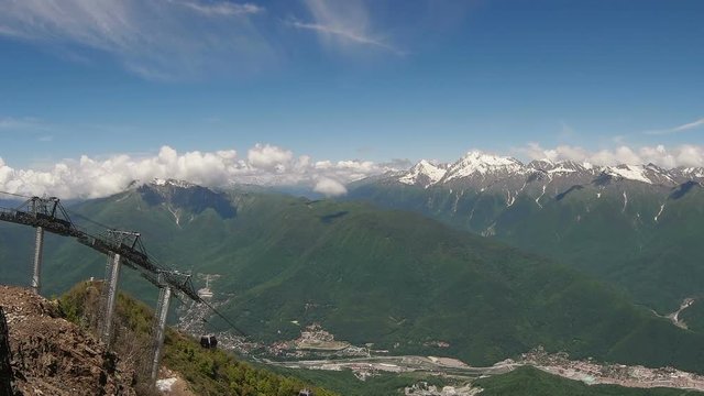 Cableway in the mountains against blue sky 
