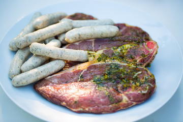 Lamb, raw lamb, grilled sausages