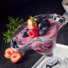 delicious pudding with wild berry