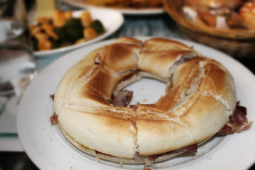 Traditional Rosca Sandwich with Ham in a Restaurant in Madrid, Spain