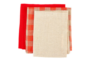 Three folded colorful napkins on white
