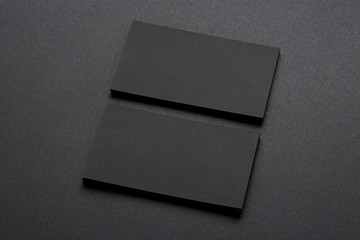 blank business cards on black background