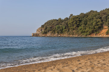 The sand and pebble beach of Mogren in Budva