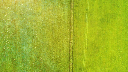 Drone flight in the summer above the are of Aachen with its flields, forest and meadows