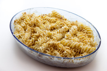 Fusilli pasta with sauce and nuts