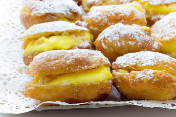 Handmade krapfen filled with pastry cream