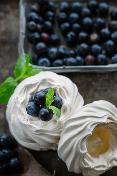 Blueberries and mint in a meringue nest.