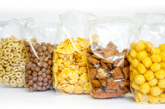 Sealed package of cornflakes vertically isolated on white background