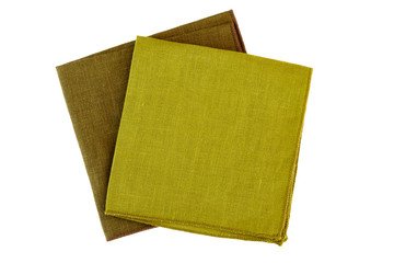 Two green textile napkins on white