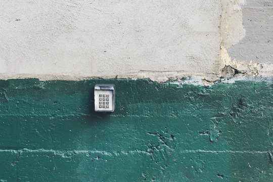 Security access control keypad on building exterior
