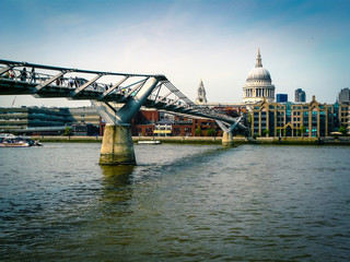Fototapeta na wymiar View of London Over the Millennium Bridge on the Thames River