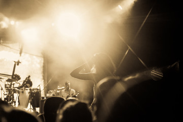 crowd with raised hands at concert - summer music festival