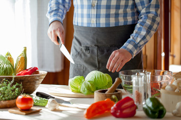 male cooking healthy salad