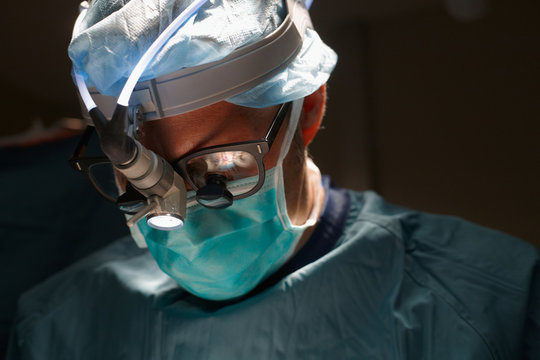 Close up of surgeon with vision system for operating