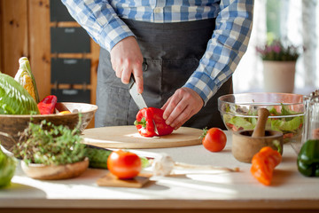 male cooking healthy salad