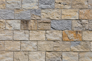 Pattern of the ancient style stone wall with cement.