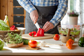 male cooking healthy salad