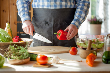 male cooking healthy salad