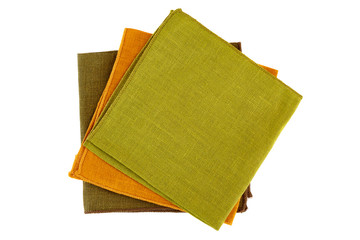 Three colorful textile napkins on white