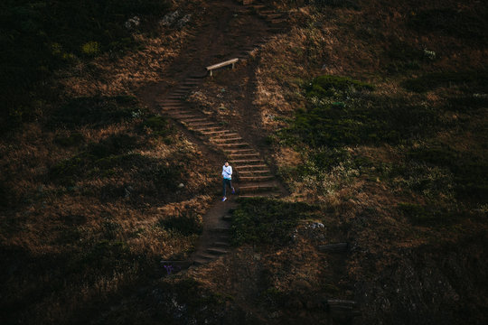 Young runner climbs stairs