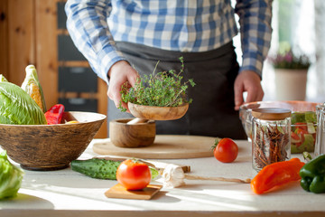 male cooking healthy salad