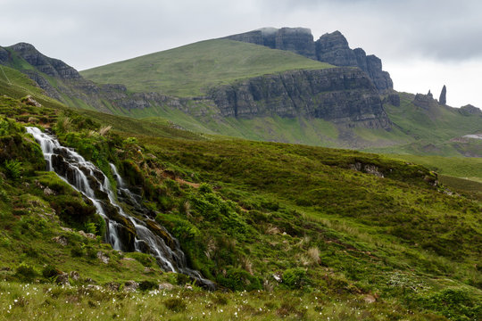 Old Man of Storr and waterfall on the Isle of Skye.