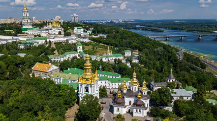 Aerial top view of Kiev Pechersk Lavra churches on hills from above, Kyiv city, Ukraine
