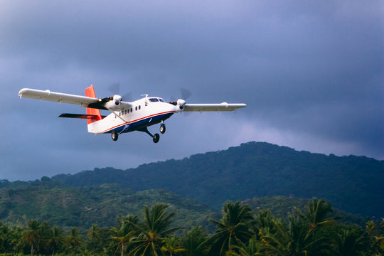Small Commuter Plane taking off from a remote jungle in Panama