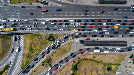 Aerial top view of road junction from above, automobile traffic and jam of many cars,...