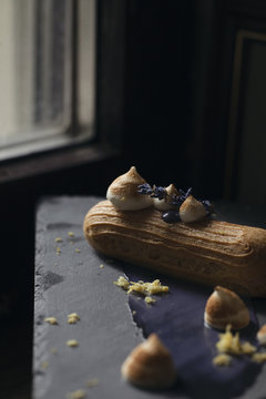 Homemade lavender french eclair in the light