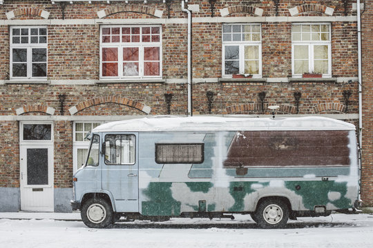 Old caravan car in the snow