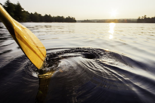 Typical Lake Water Swirl After Paddle Stroke in Canoe