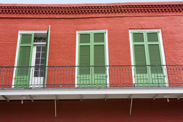 Colorful Building With Green Doors on Bourbon Street In New Orleans