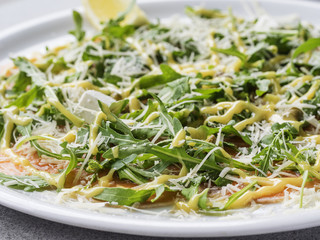 Salmon carpaccio with feta pieces
