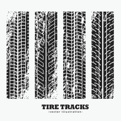 set of four grungy wheel tire tracks