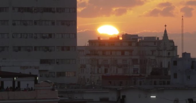 A time lapse view of the sun setting over Havana, Cuba.  	