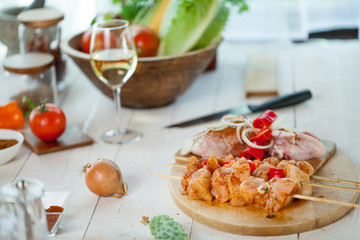 male preparing chicken for cooking