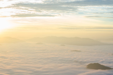 Fototapeta na wymiar Sunrise and foggy mountain view at Phu Chi Dow, Chiang Rai, Thailand