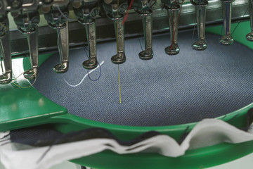 Emboidery machine starting a first stitch of a emboidery process.