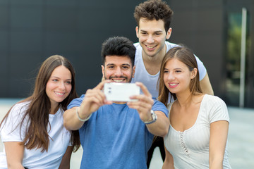 Fototapeta premium Group of friends taking a selfie together