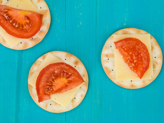 Cheese and Tomato on Water Biscuit Crackers