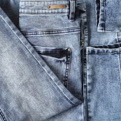 BLue folded denim jean close up background