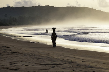 Woman on beach Ghana coast