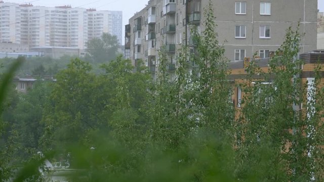 Storm and rain in city Russia