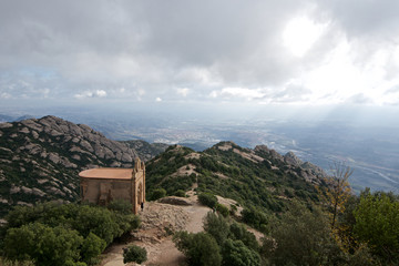 Fototapeta na wymiar Scenic view of rocky mountains on a stormy day in Spain