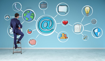 Businessman watching multimedia interface sketch on a wall 3D rendering