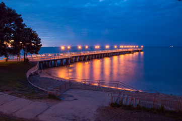 Sunrise with pier at Baltic sea in Gdynia Orlowo.