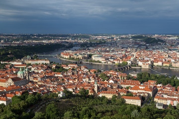 Fototapeta na wymiar View of the Petrin Hill, Mala Strana (Lesser Town) and Old Town districts and beyond in Prague, Czech Republic, from above.