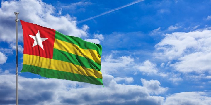 Togo waving flag on blue sky. 3d illustration