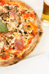 Italian pizza ham mushrooms selective focus